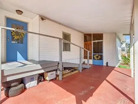 a view of livingroom with furniture and window