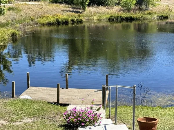 a view of a lake with a patio