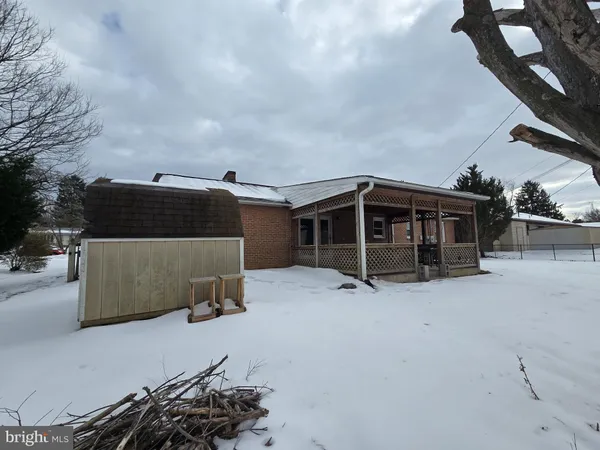 a view of a car in front of a house