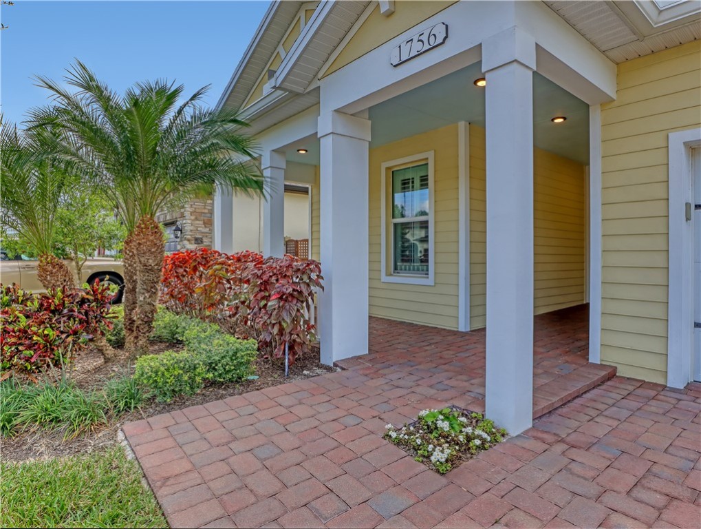 1756 Willows Square Vero Beach, FL 32966 - Photo 2 of 35 a front view of a house