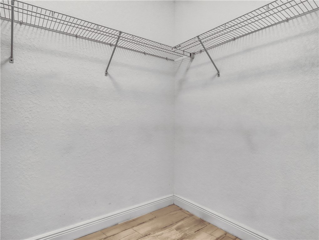 1756 Willows Square Vero Beach, FL 32966 - Photo 21 of 35 a view of a room with racks on the wall