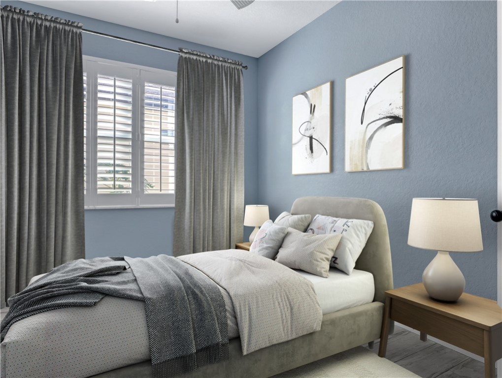 1756 Willows Square Vero Beach, FL 32966 - Photo 28 of 35 a bedroom with a bed and window