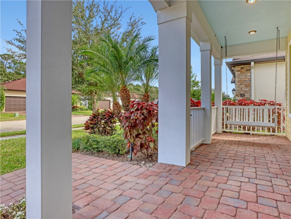 1756 Willows Square Vero Beach, FL 32966 - Photo 3 of 35 a view of a porch with a yard