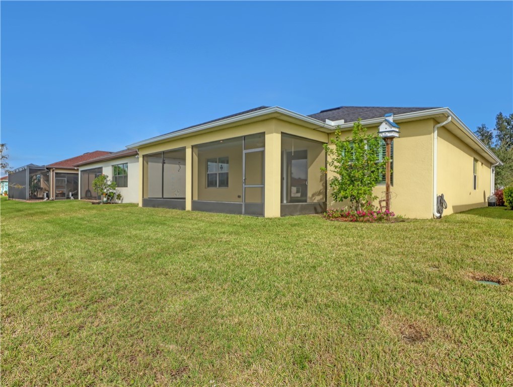 1756 Willows Square Vero Beach, FL 32966 - Photo 32 of 35 a front view of house with yard