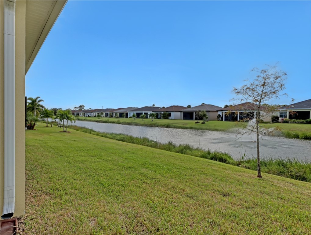 1756 Willows Square Vero Beach, FL 32966 - Photo 34 of 35 a view of a lake with a yard
