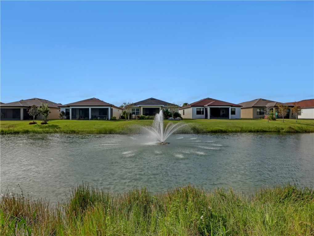 1756 Willows Square Vero Beach, FL 32966 - Photo 35 of 35 a view of residential houses with outdoor space and lake view