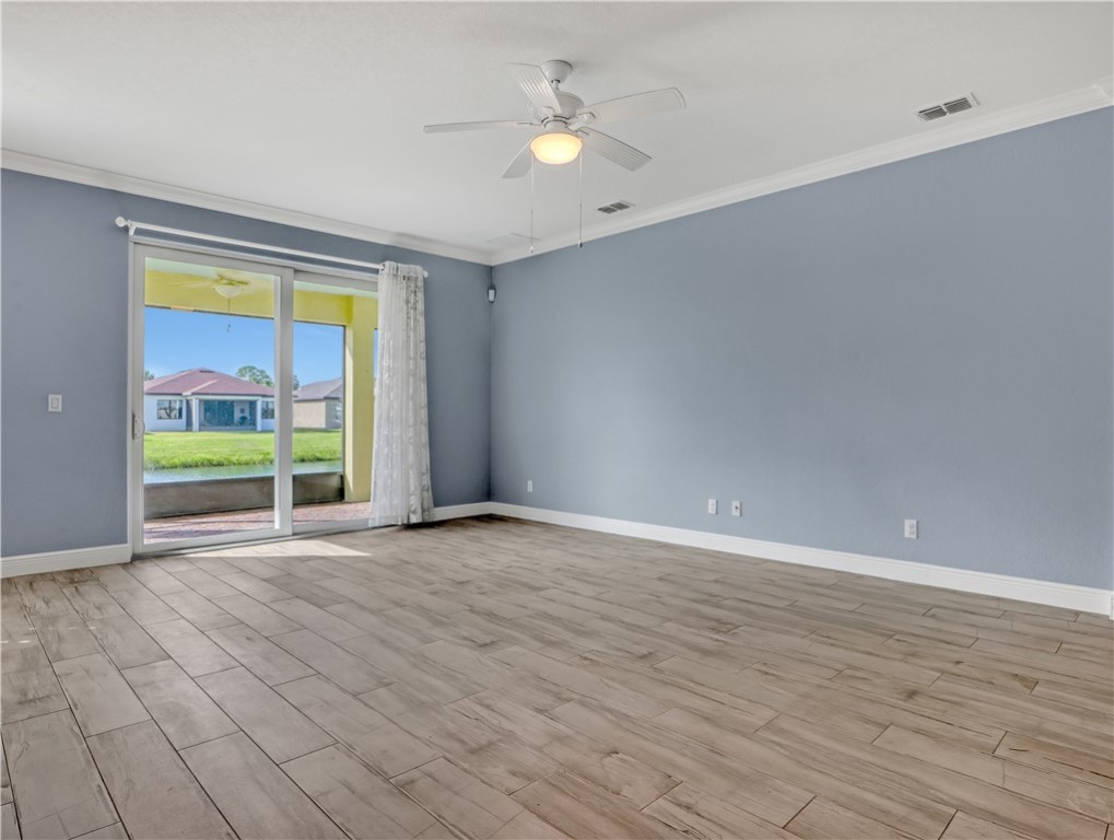 1756 Willows Square Vero Beach, FL 32966 - Photo 6 of 35 a view of an empty room with a window