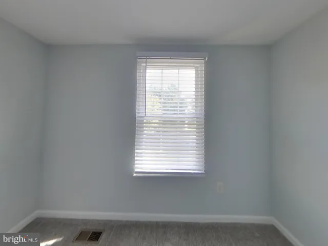 a view of a small space with a window