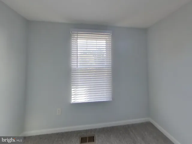 a view of a small space with a window