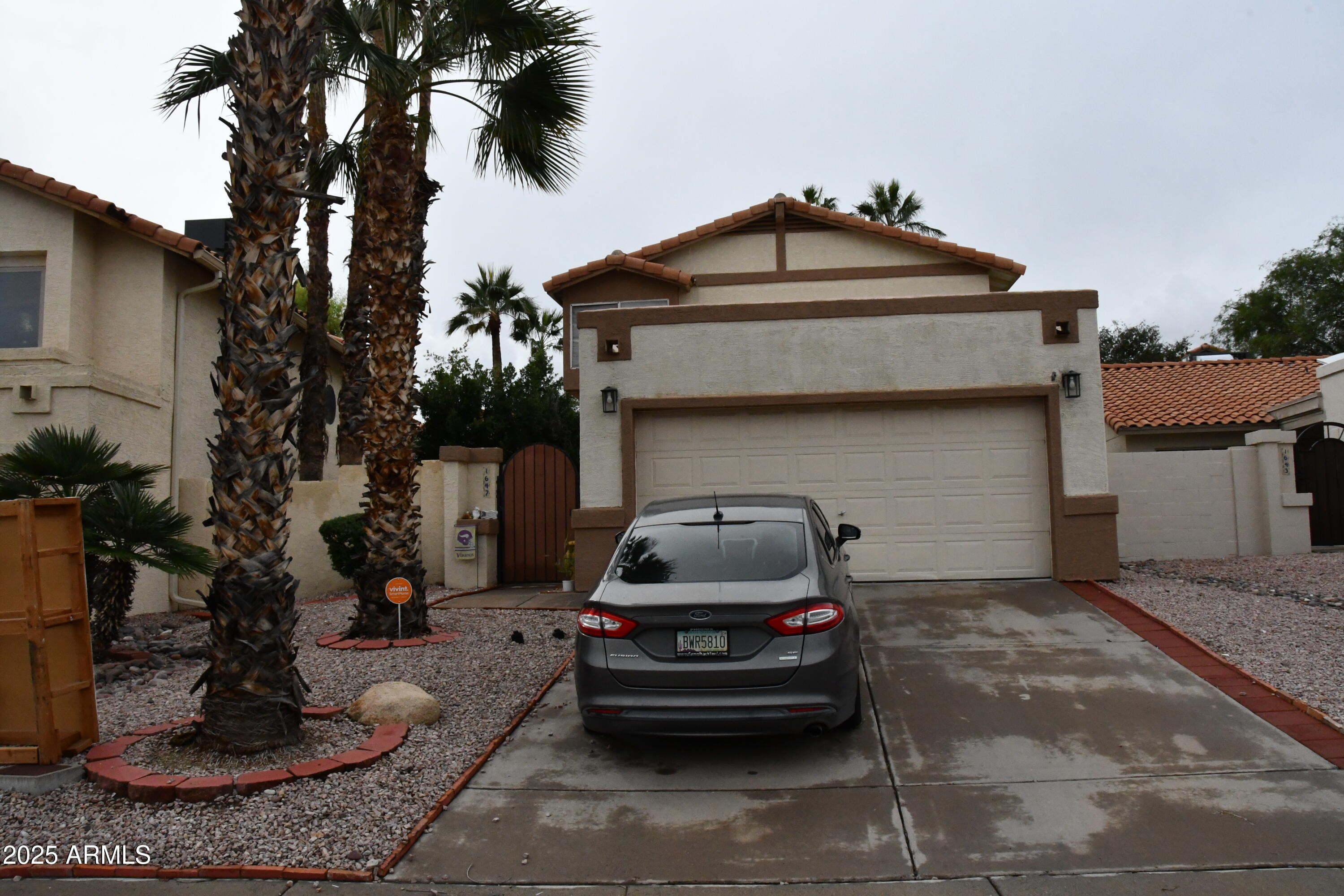 a car parked in front of a house