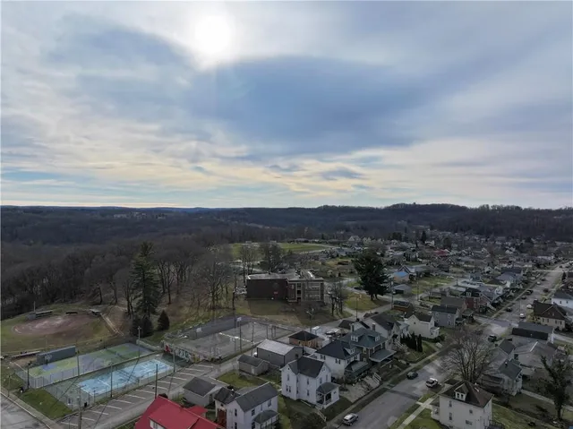 a view of a city with lots of trees