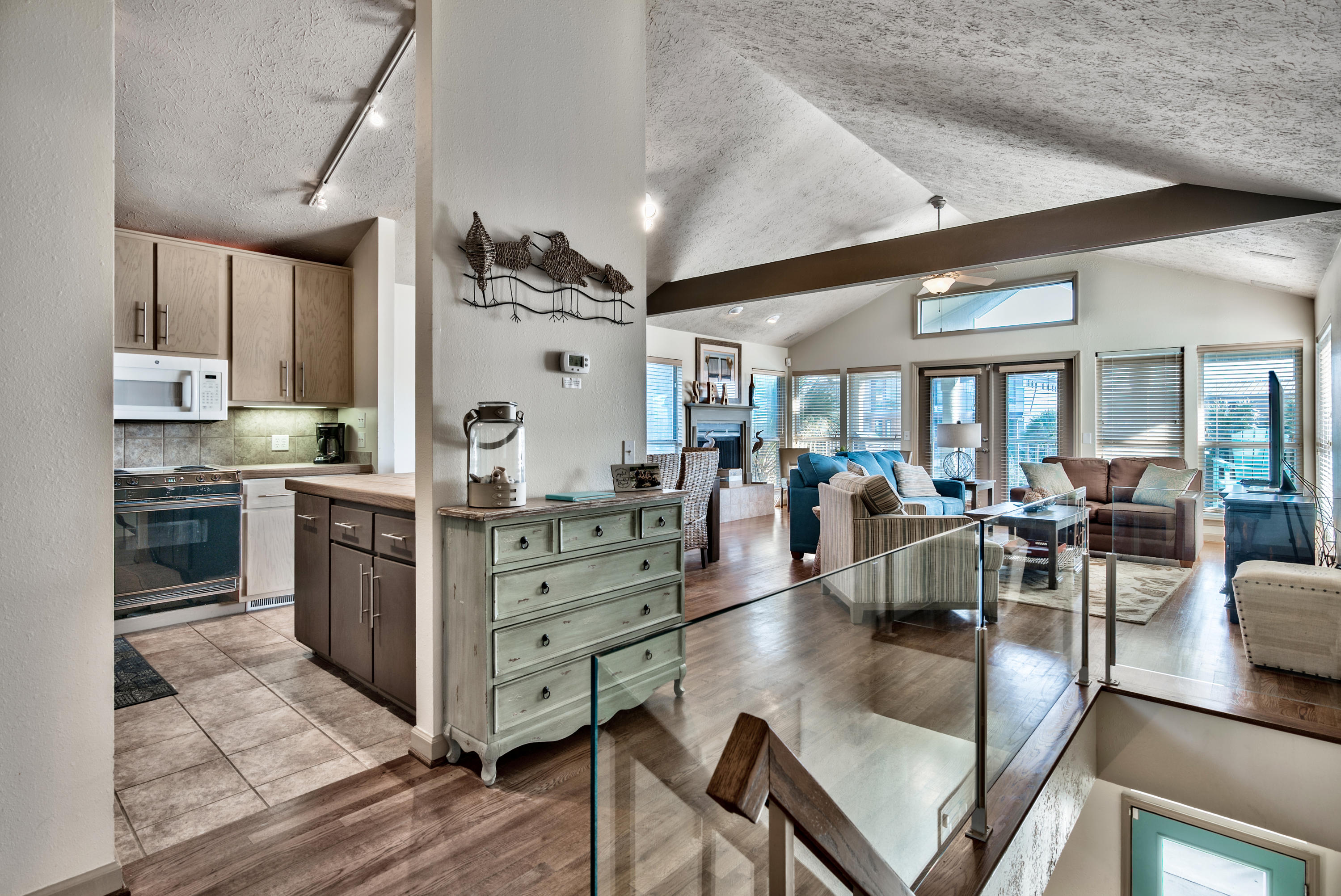 178 Pelican Circle Inlet Beach, FL 32461 - Photo 11 of 61 a large kitchen with stainless steel appliances lots of counter space dining table and chairs