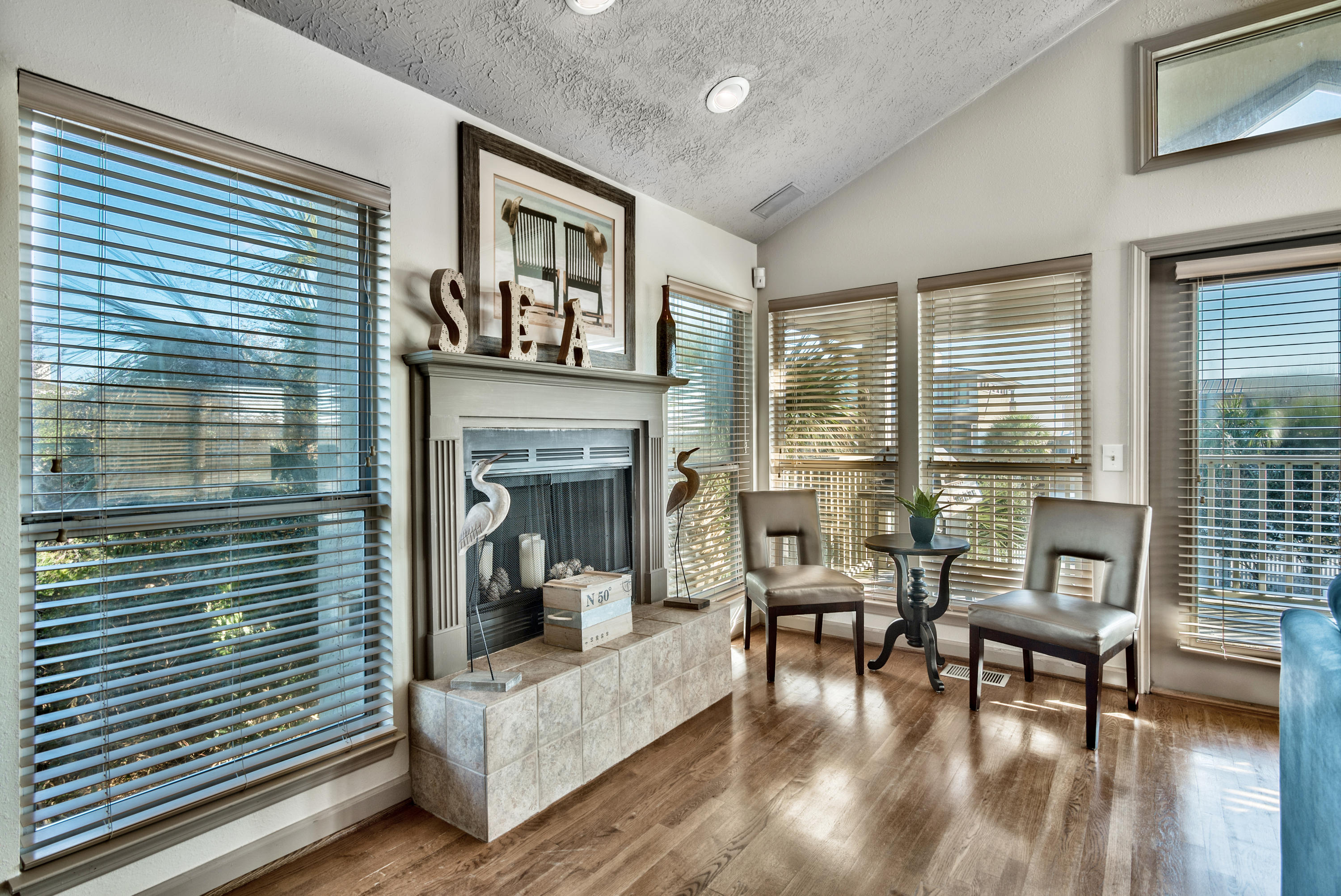 178 Pelican Circle Inlet Beach, FL 32461 - Photo 15 of 61 a living room with furniture and a fireplace
