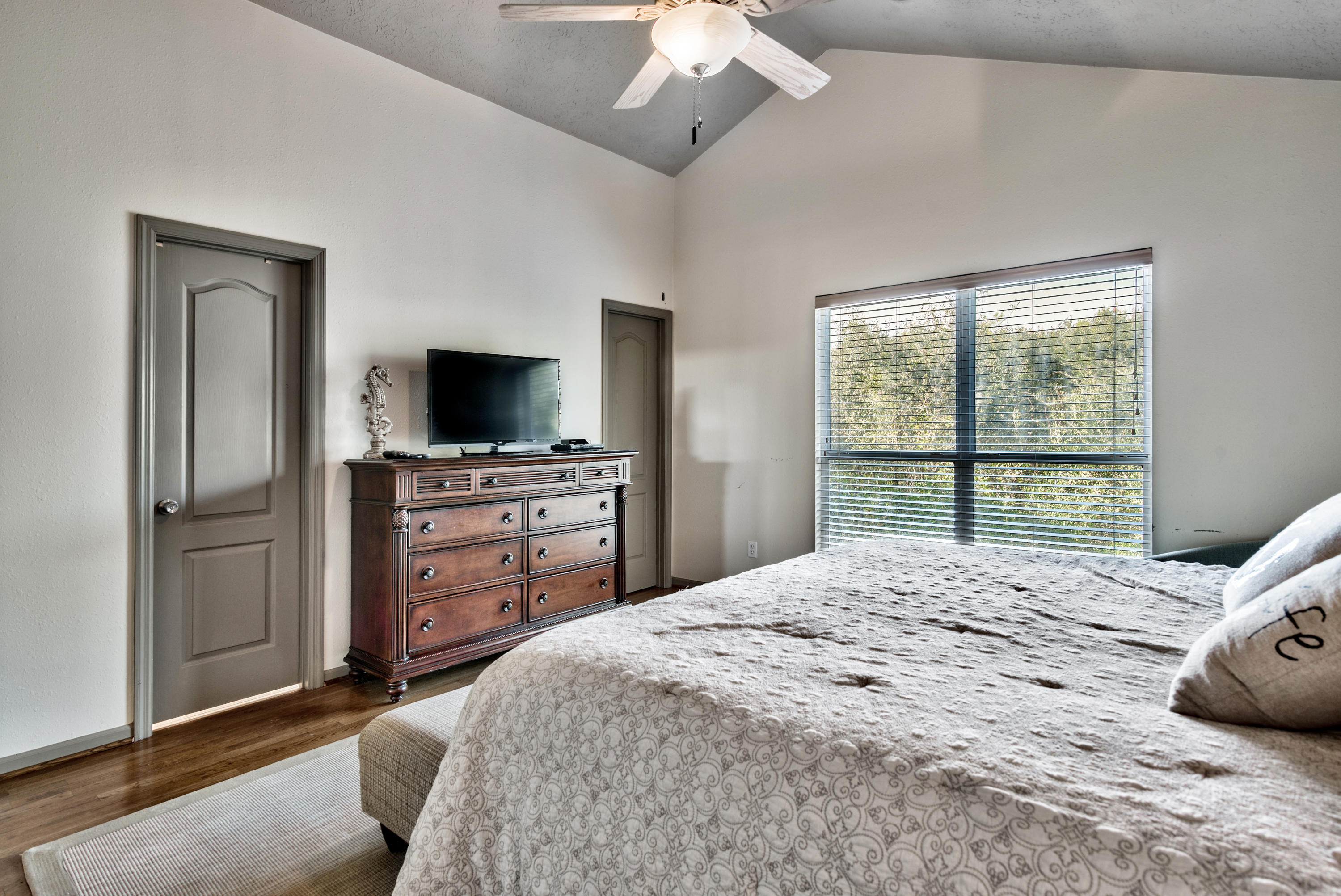 178 Pelican Circle Inlet Beach, FL 32461 - Photo 25 of 61 a bedroom with a bed and a flat screen tv