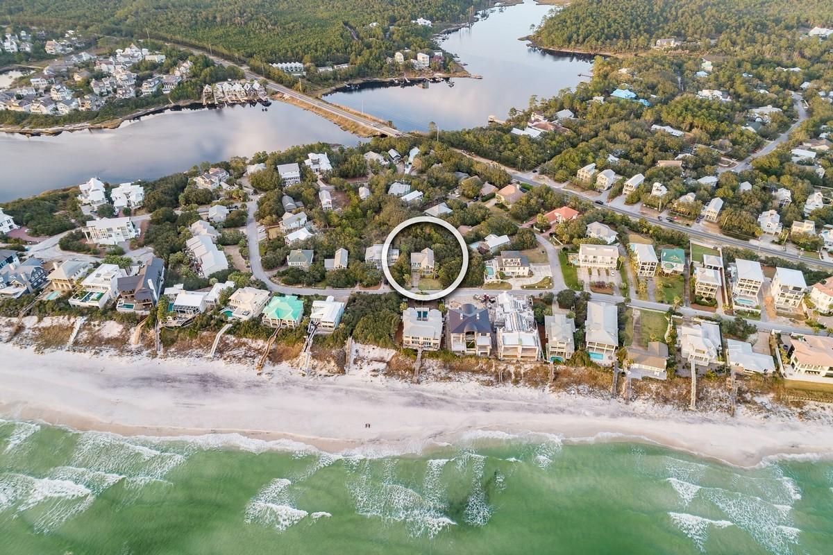 178 Pelican Circle Inlet Beach, FL 32461 - Photo 60 of 61 a backyard of a house with table and chairs