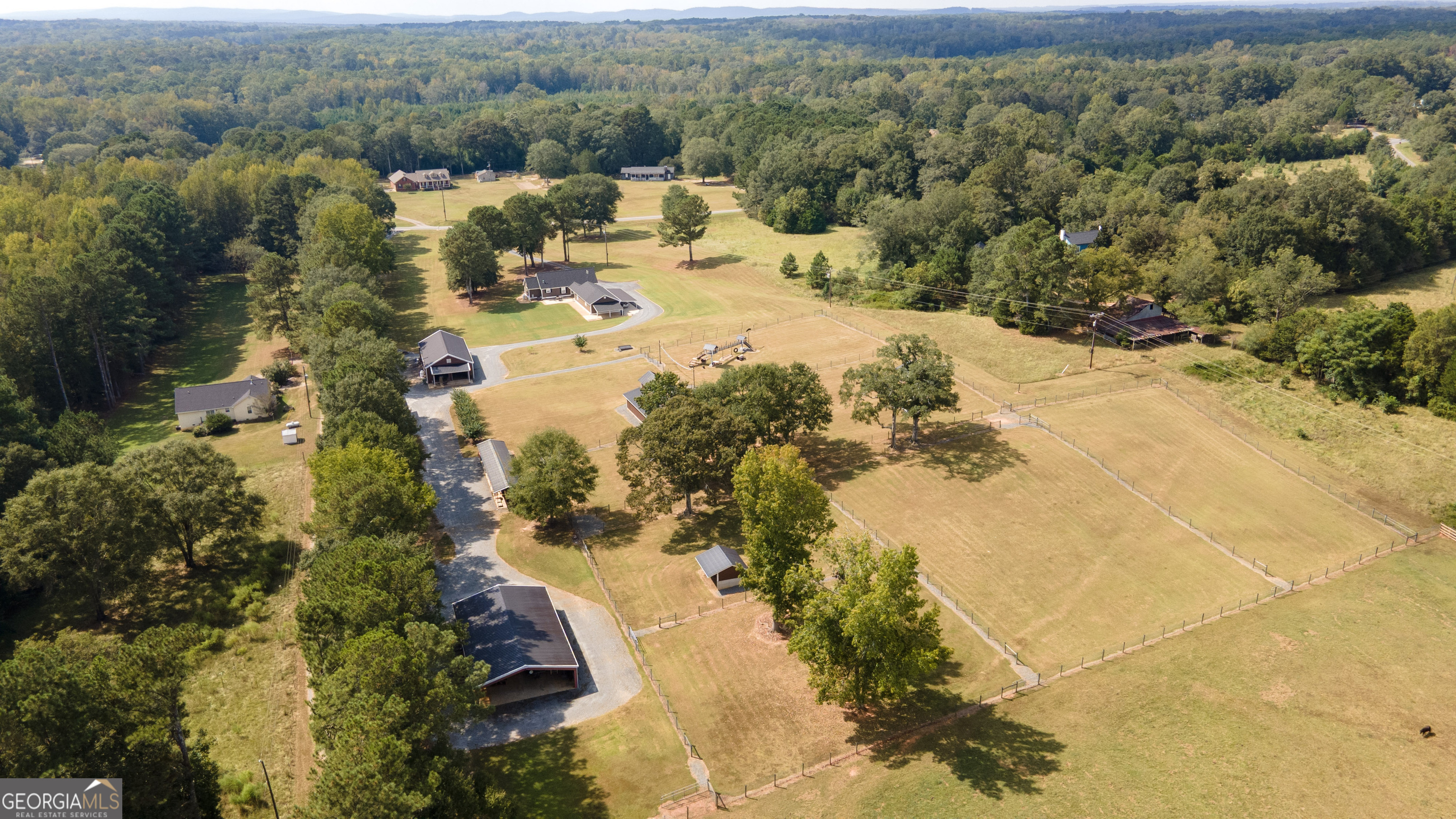 410 Country Kitchen Road Barnesville, GA 30204 - Photo 113 of 120 a view of a lake with mountains in the background