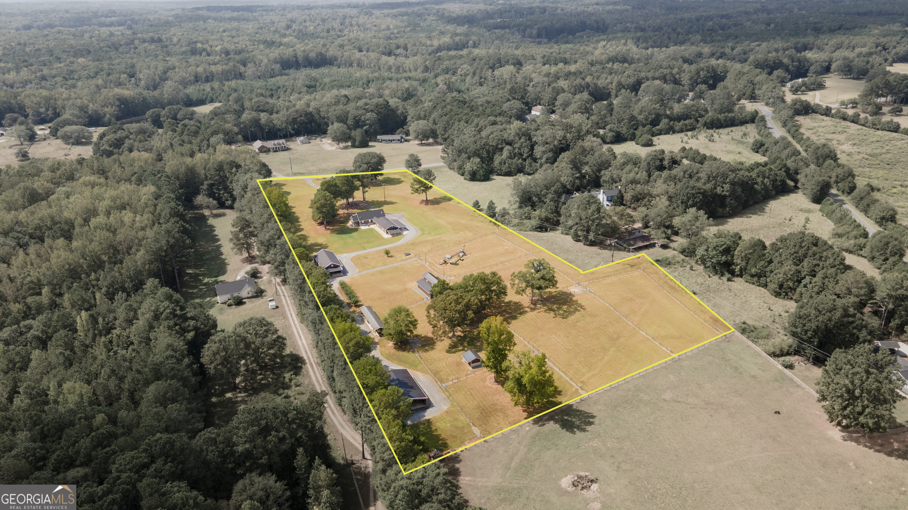 410 Country Kitchen Road Barnesville, GA 30204 - Photo 116 of 120 an aerial view of a house with a yard and ocean view