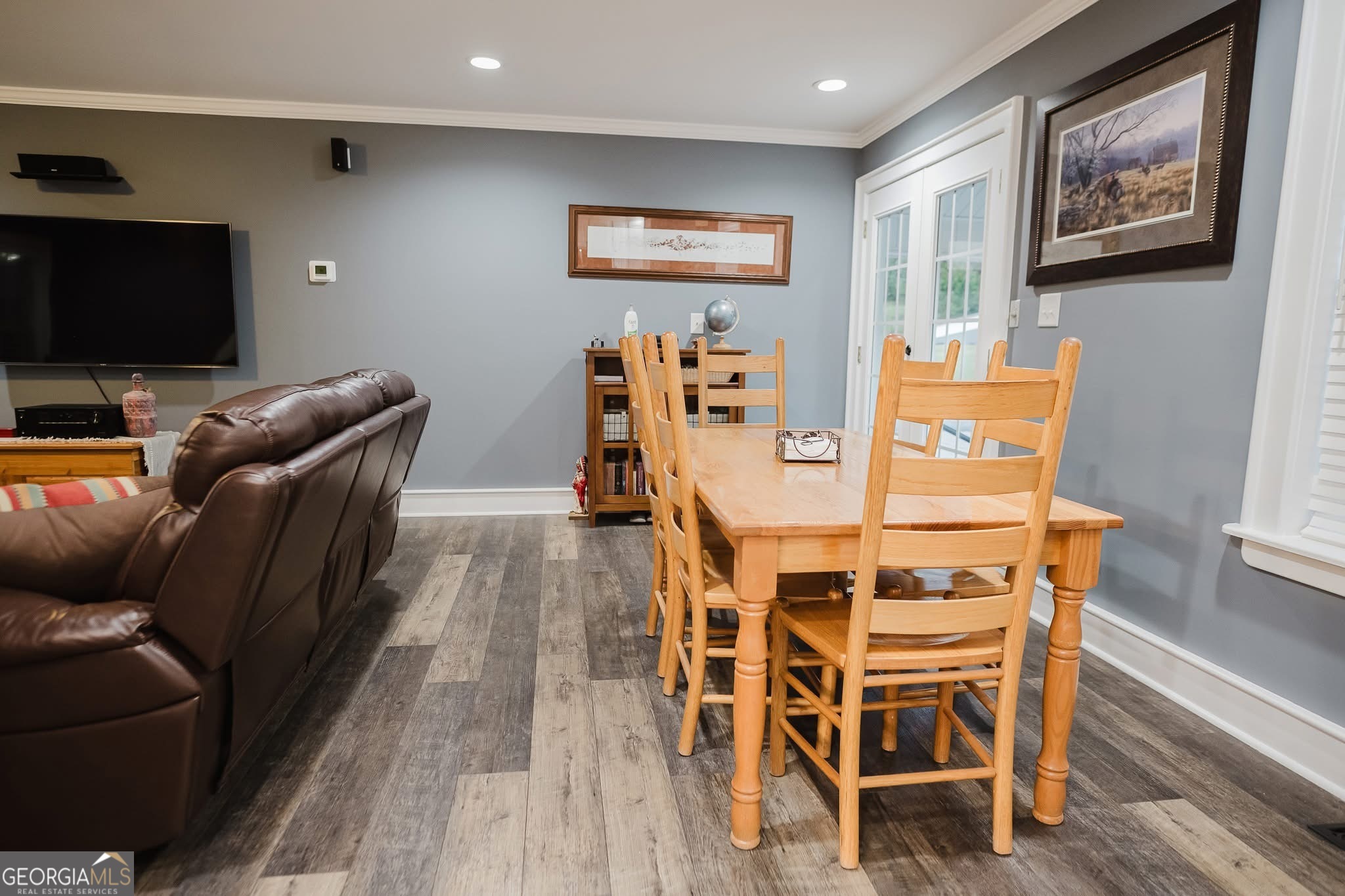 410 Country Kitchen Road Barnesville, GA 30204 - Photo 18 of 120 a living room with furniture and a flat screen tv