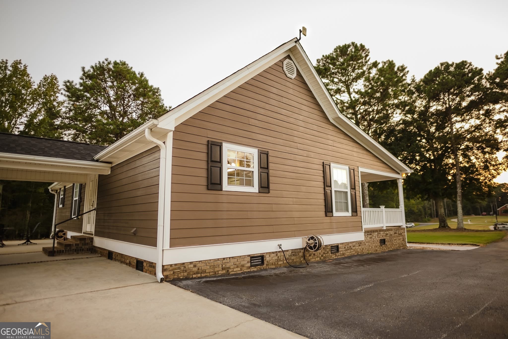 410 Country Kitchen Road Barnesville, GA 30204 - Photo 50 of 120 a view of a house with a yard