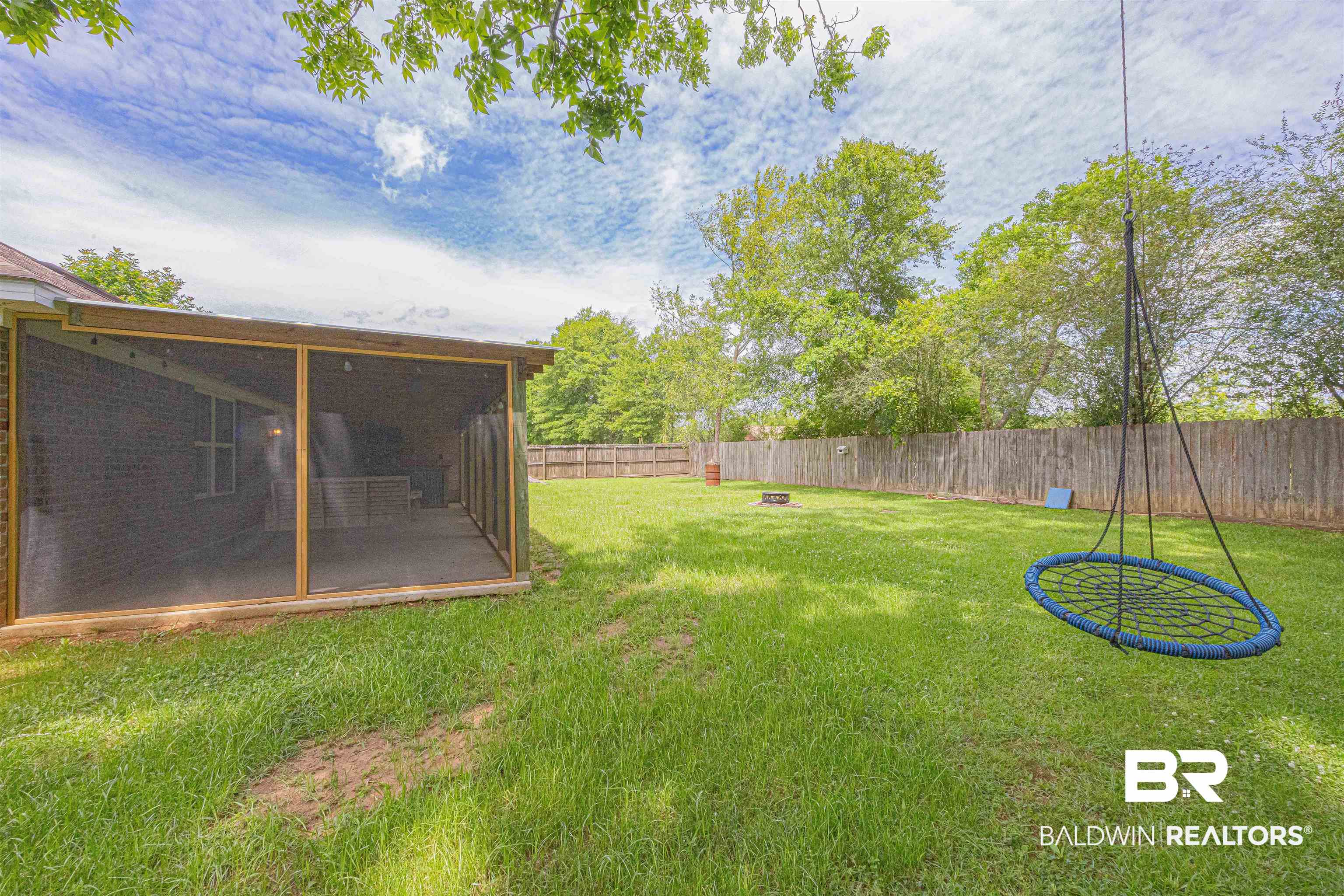 18675 Explorer Drive Loxley, AL 36551 - Photo 41 of 42 View of yard with a sunroom
