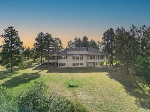 a view of outdoor space with deck and yard