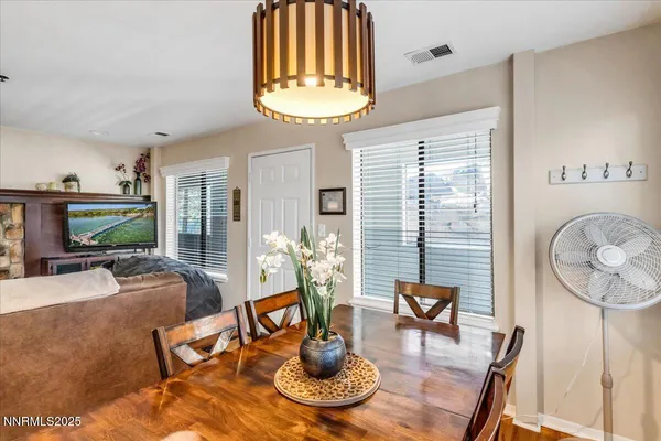 a kitchen with a stove and a refrigerator