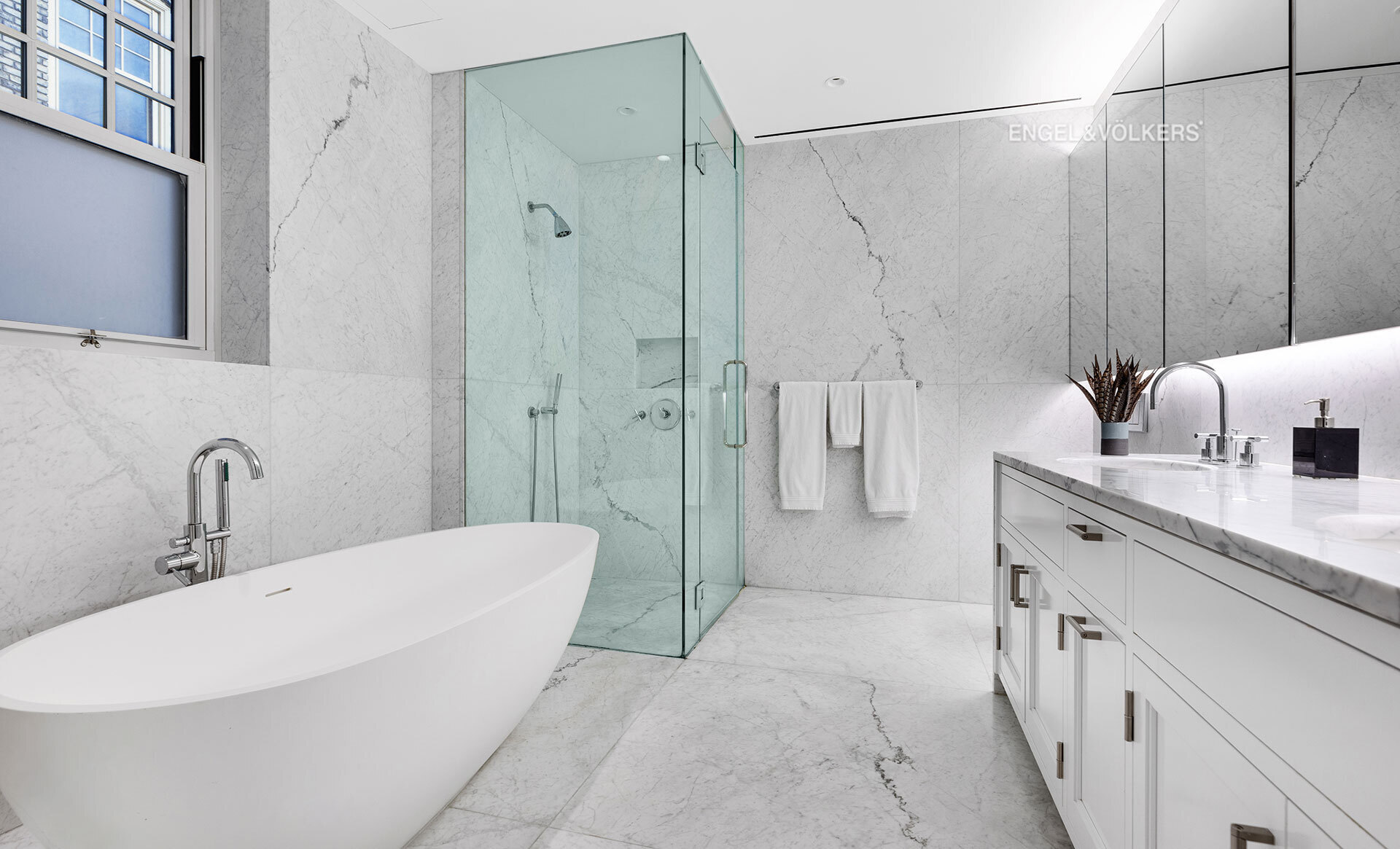 150 East 72nd Street, Unit 4S Manhattan, NY 10021 - Photo 12 of 13 a bathroom with a granite countertop sink a toilet and shower