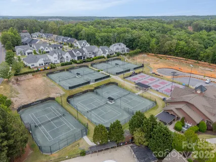 an aerial view of a house with a garden