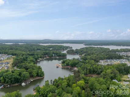 an aerial view of residential building and lake view