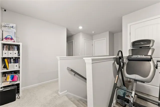 a view of a workspace with furniture