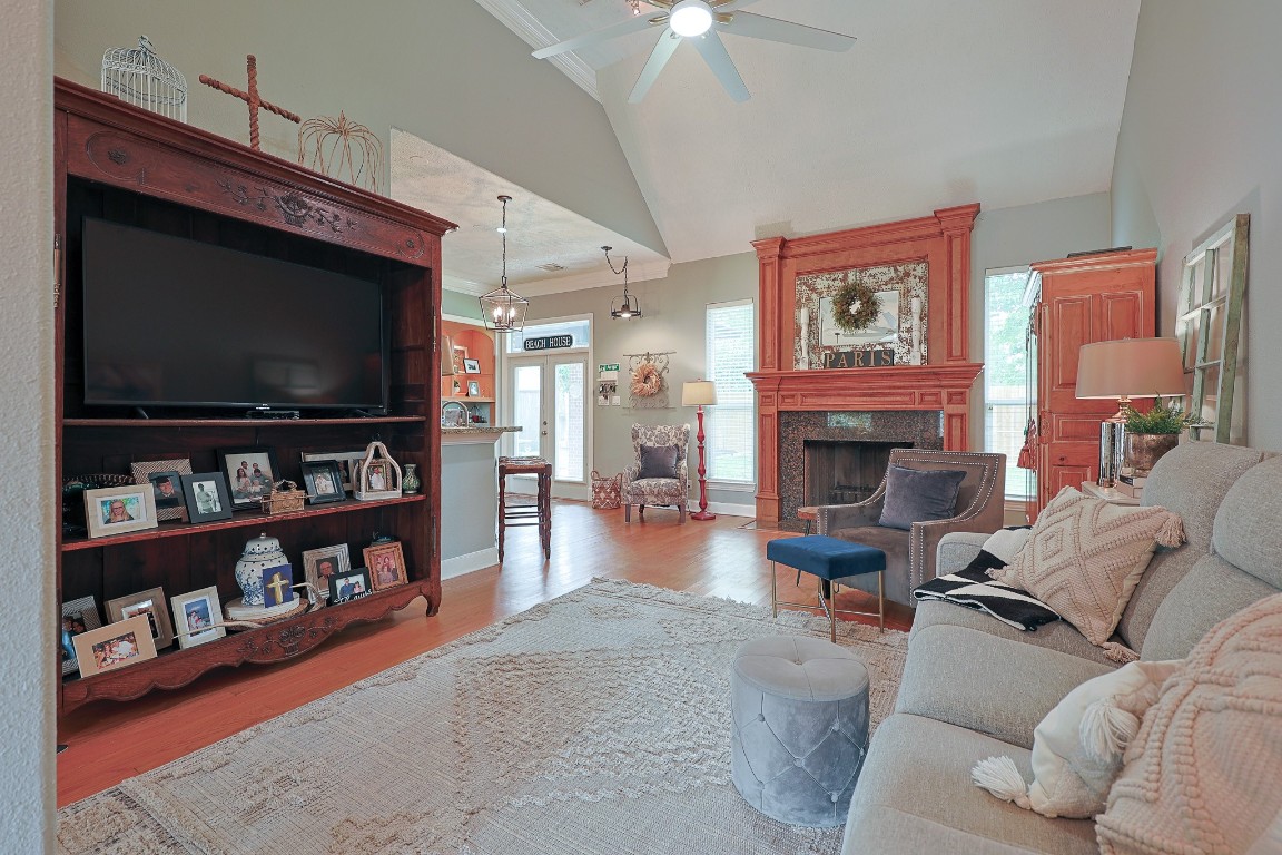4704 Donald Street Seabrook, TX 77586 - Photo 14 of 42 a living room with furniture and a flat screen tv