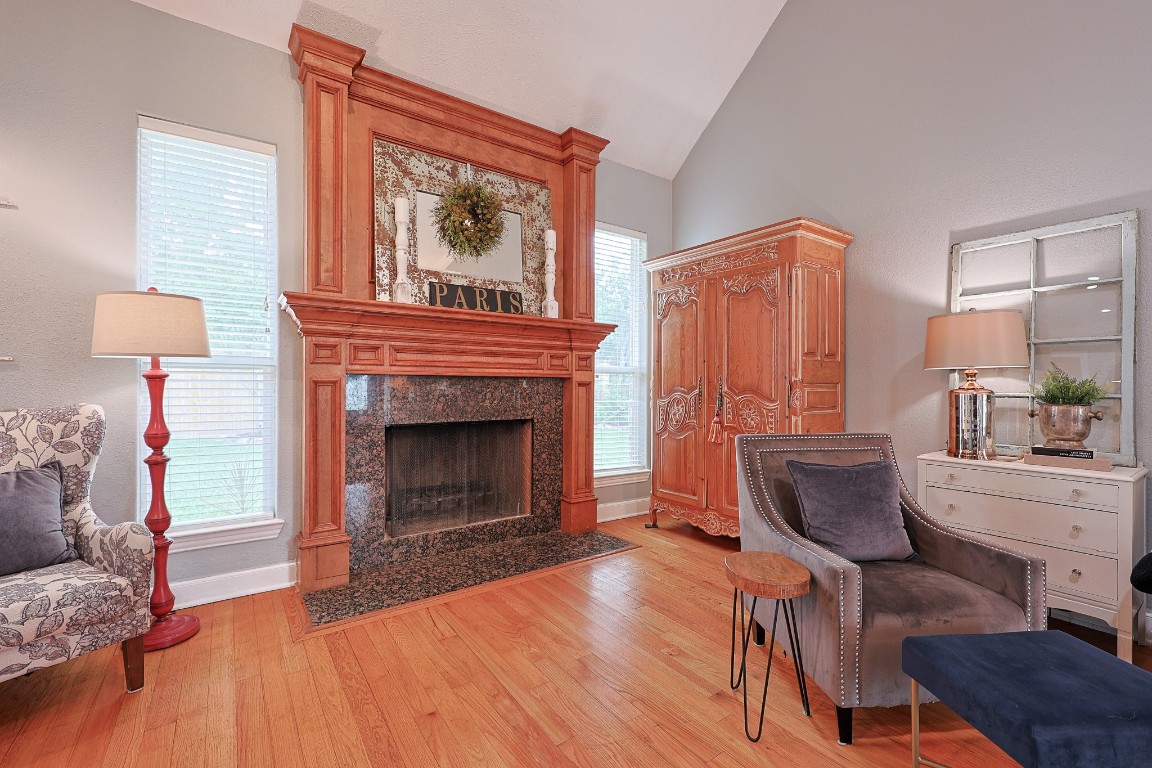 4704 Donald Street Seabrook, TX 77586 - Photo 15 of 42 a living room with furniture and a fireplace