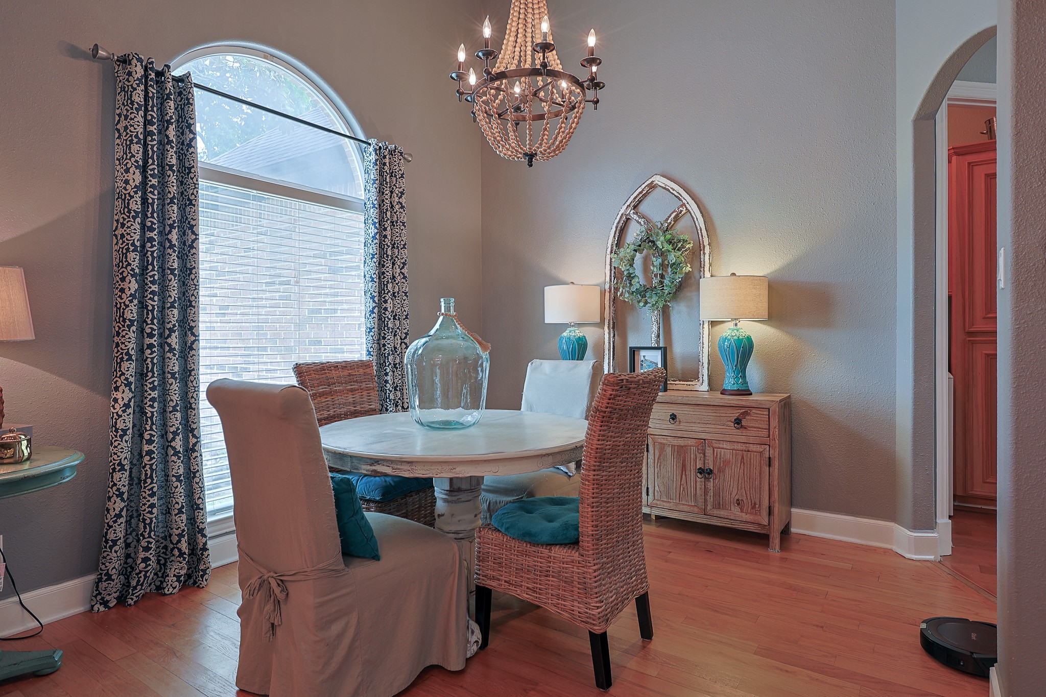 4704 Donald Street Seabrook, TX 77586 - Photo 17 of 42 a dining room with furniture a chandelier and wooden floor