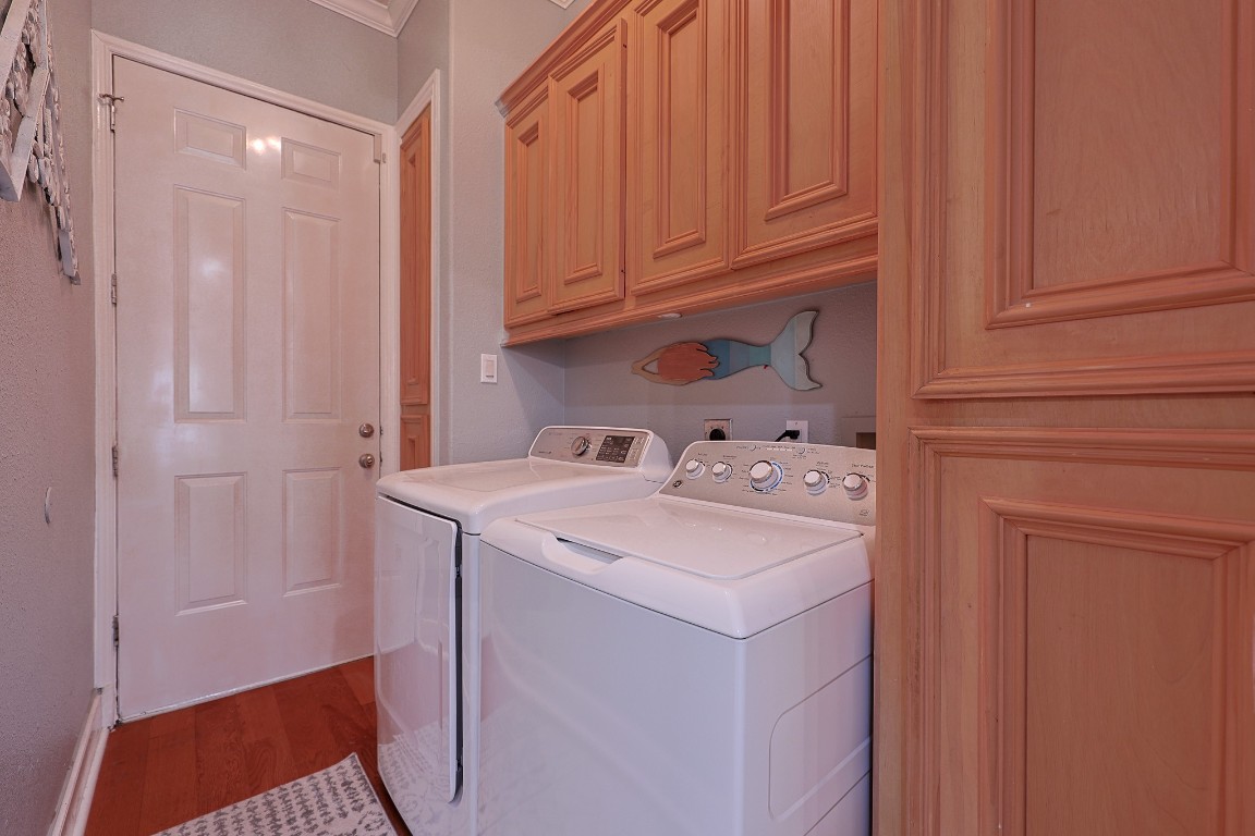 4704 Donald Street Seabrook, TX 77586 - Photo 24 of 42 a utility room with dryer and washer