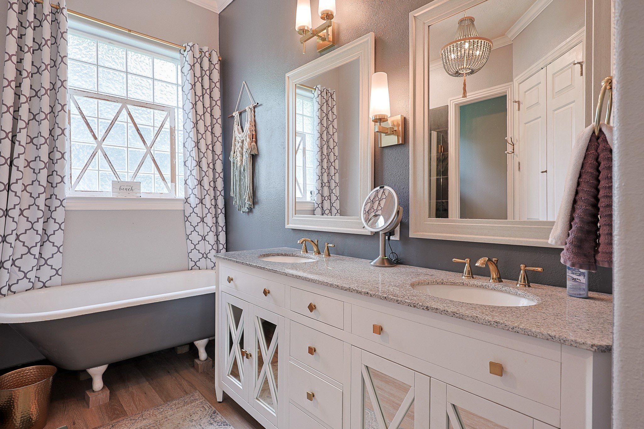 4704 Donald Street Seabrook, TX 77586 - Photo 28 of 42 a bathroom with a granite countertop sink mirror and a bathtub