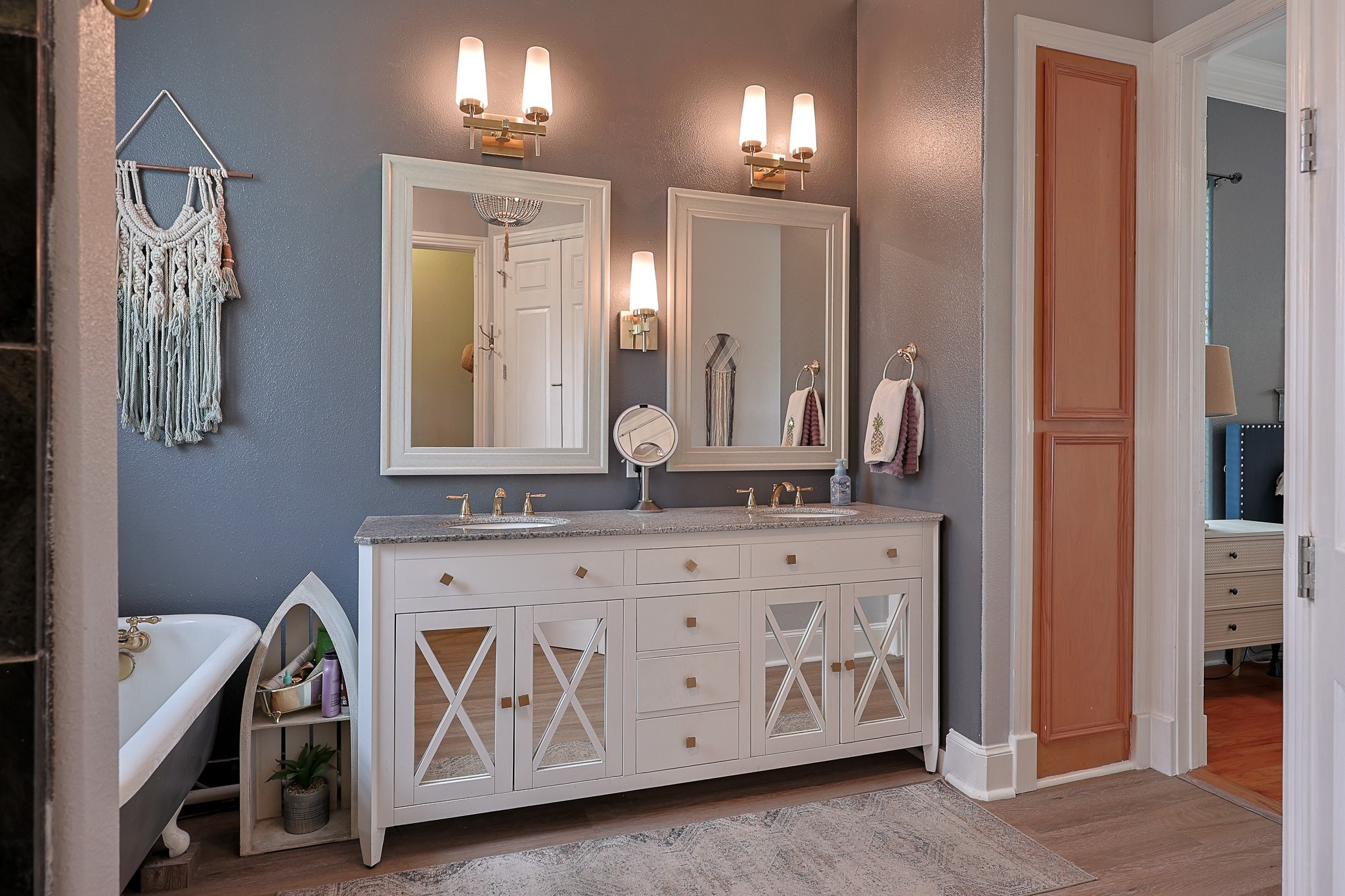 4704 Donald Street Seabrook, TX 77586 - Photo 29 of 42 a bathroom with a sink a mirror and a vanity