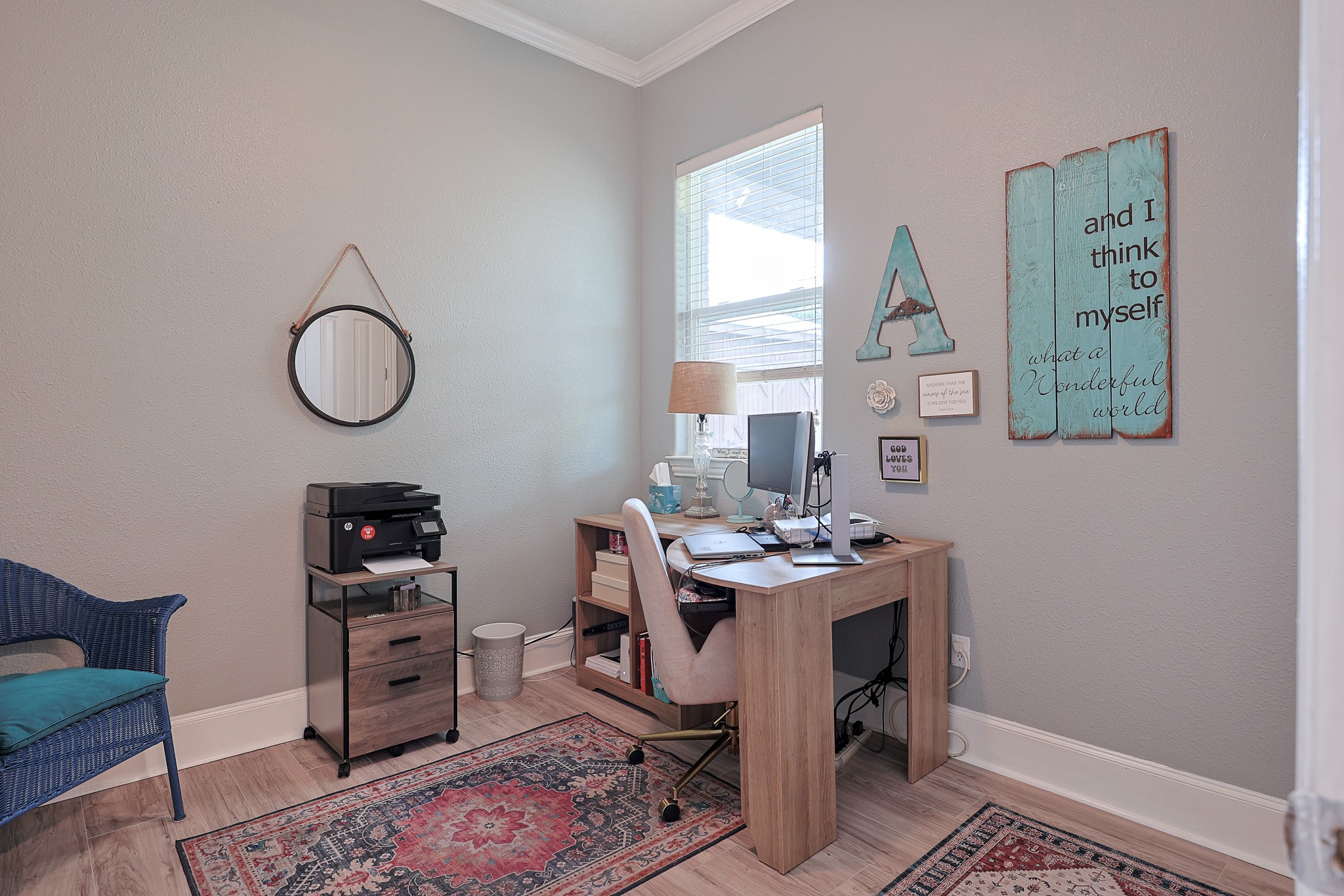 4704 Donald Street Seabrook, TX 77586 - Photo 32 of 42 a view of a workspace with furniture and a window