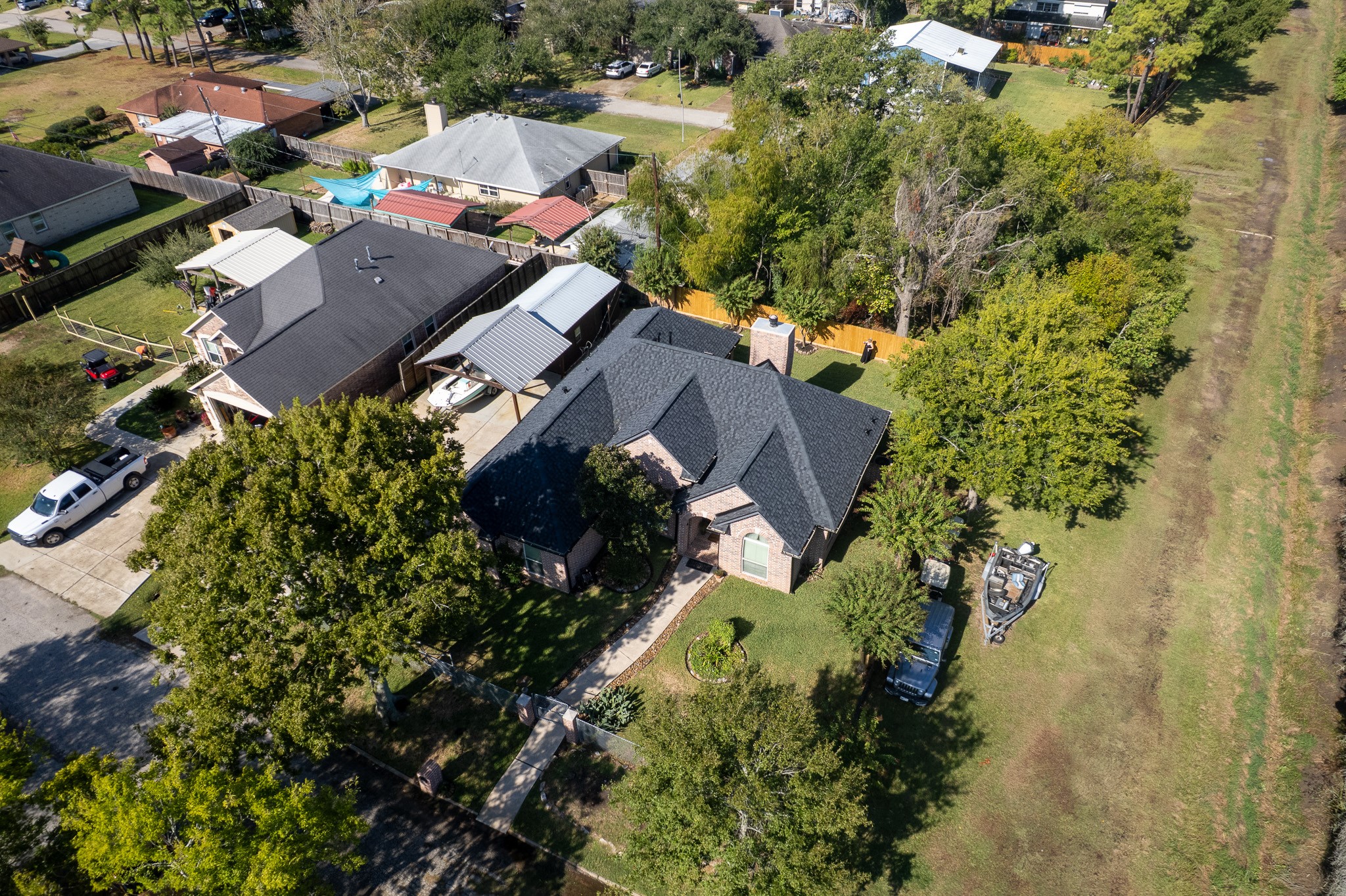 4704 Donald Street Seabrook, TX 77586 - Photo 36 of 42 an aerial view of a house with a yard