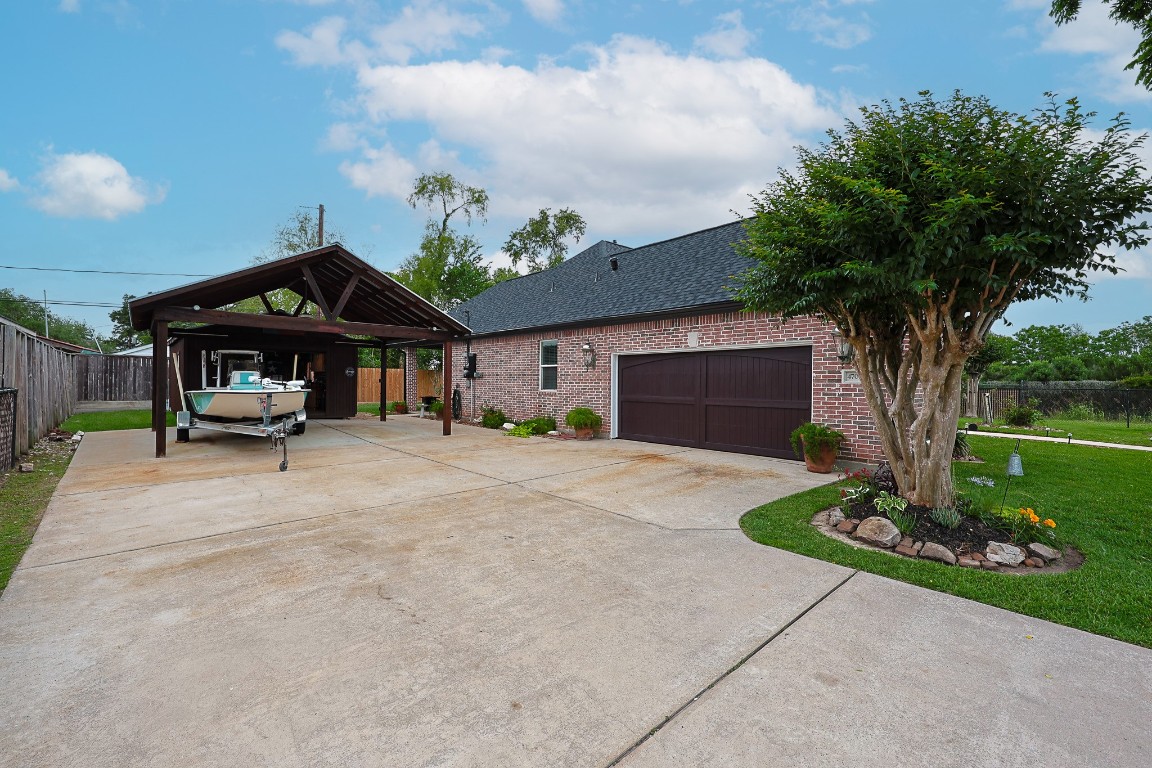4704 Donald Street Seabrook, TX 77586 - Photo 4 of 42 a swimming pool with barbeque oven in front of it