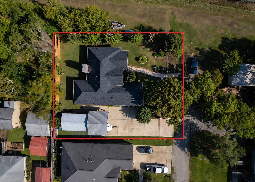 4704 Donald Street Seabrook, TX 77586 - Photo 9 of 42 an aerial view of a house with a lake view