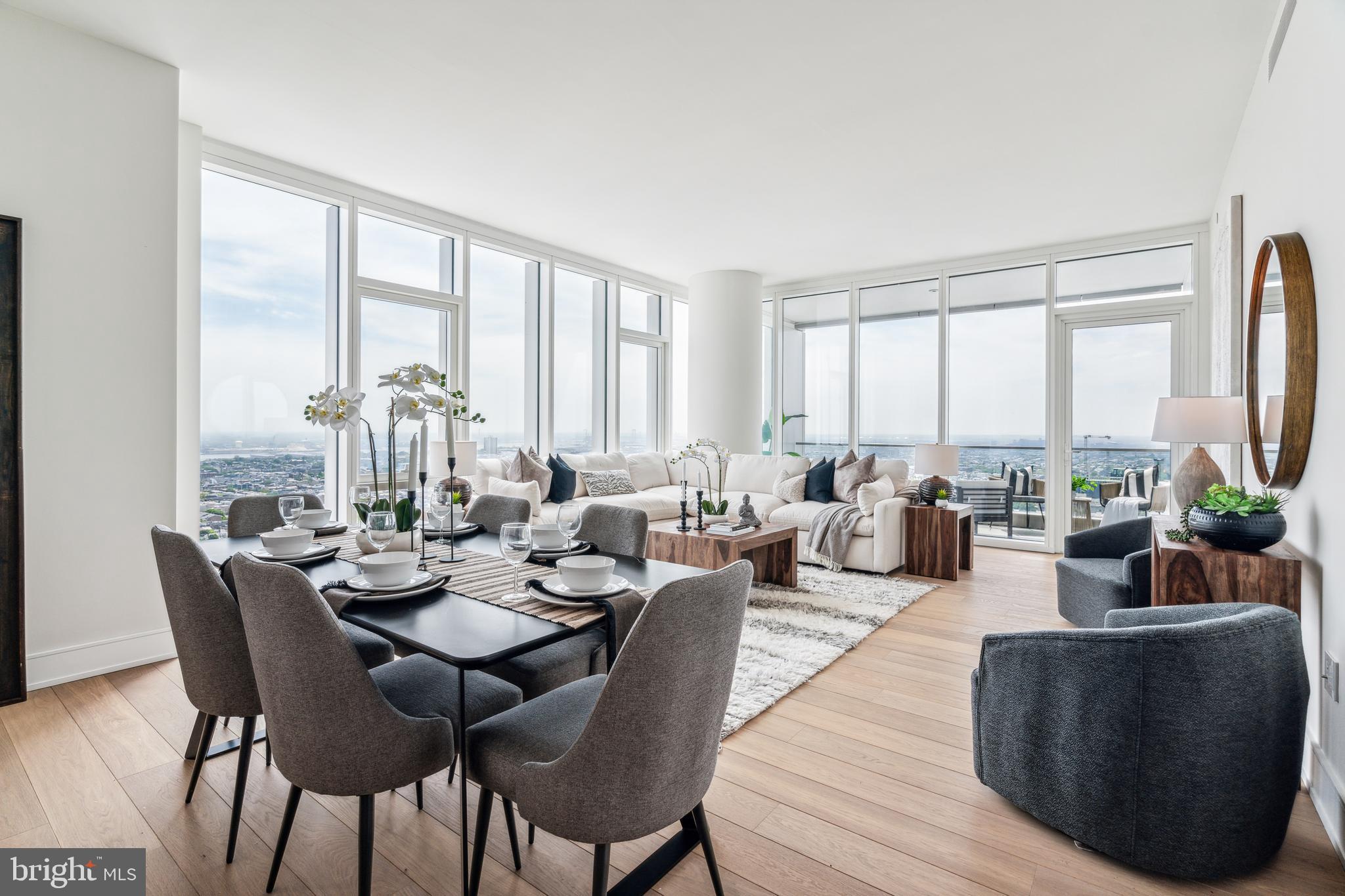 301 South Broad Street, Unit 2502 Philadelphia, PA 19107 - Photo 2 of 28 Wrap - around windows in the Great Room