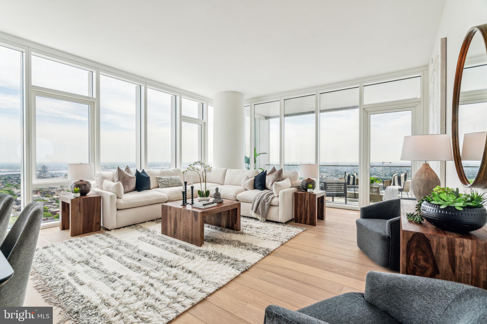 301 South Broad Street, Unit 2502 Philadelphia, PA 19107 - Photo 6 of 28 City views from our 10' windows - decorated model