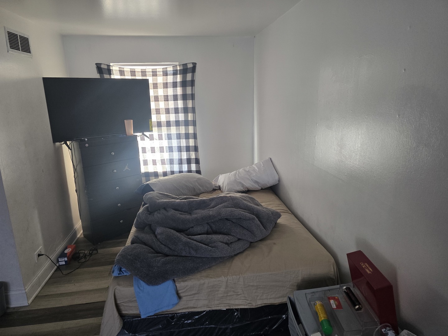 173 Williamsburg Road Country Club Hills, IL 60478 - Photo 12 of 22 a bed sitting in a bedroom next to a window