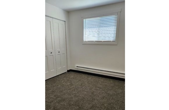 160 North 1st Street Teton, ID 83451 - Photo 7 of 11 a view of an empty room with a window