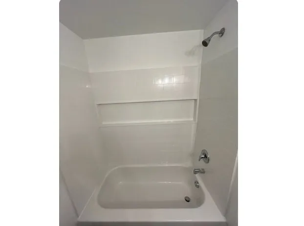 a close up of a bathtub