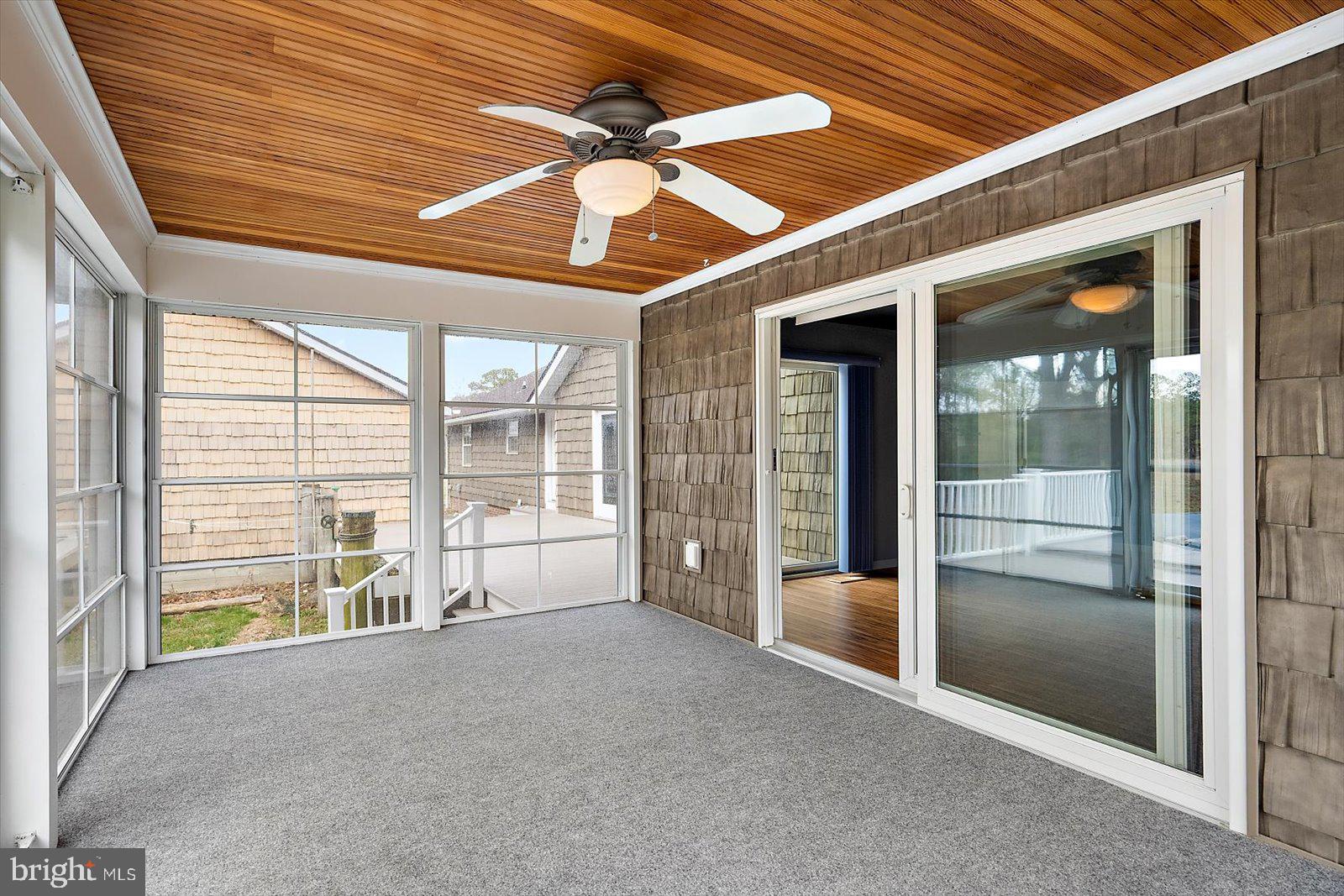 9554 Millard Long Road Westover, MD 21871 - Photo 29 of 69 a view of an empty room with a balcony