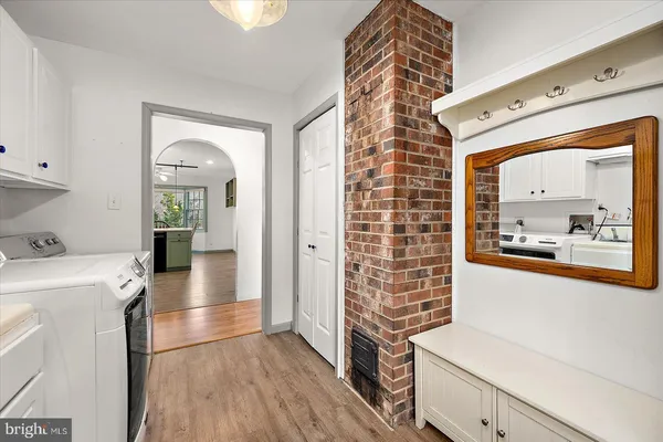 a view of a yard with a house in the background