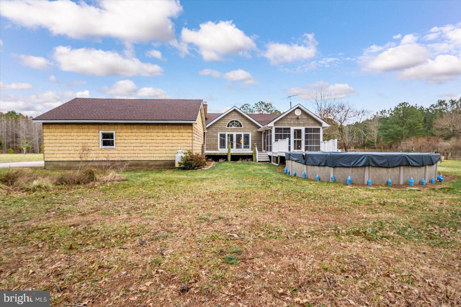 9554 Millard Long Road Westover, MD 21871 - Photo 36 of 69 a view of a house with a yard and fence