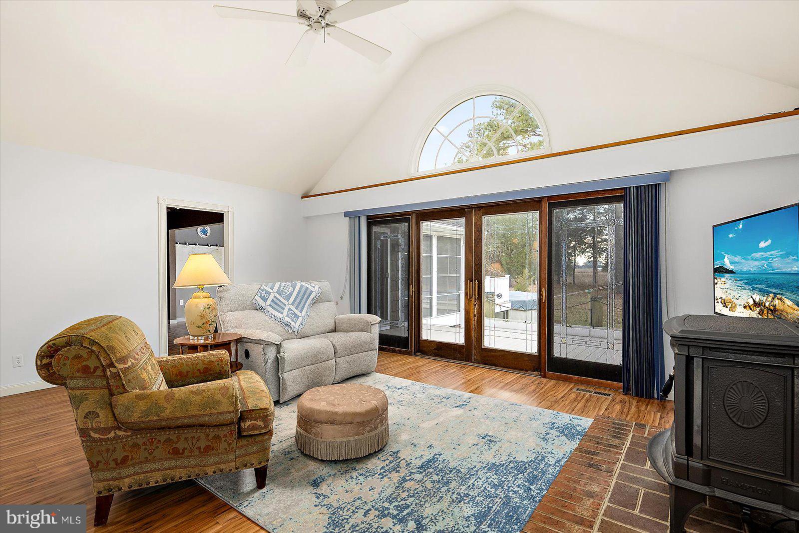 9554 Millard Long Road Westover, MD 21871 - Photo 6 of 69 a living room with furniture two window and a fireplace