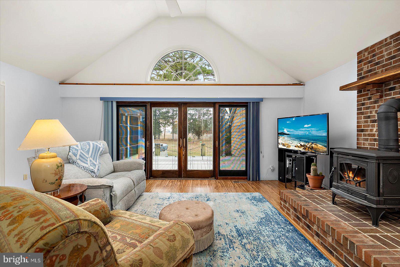 9554 Millard Long Road Westover, MD 21871 - Photo 7 of 69 a living room with furniture large window and fireplace